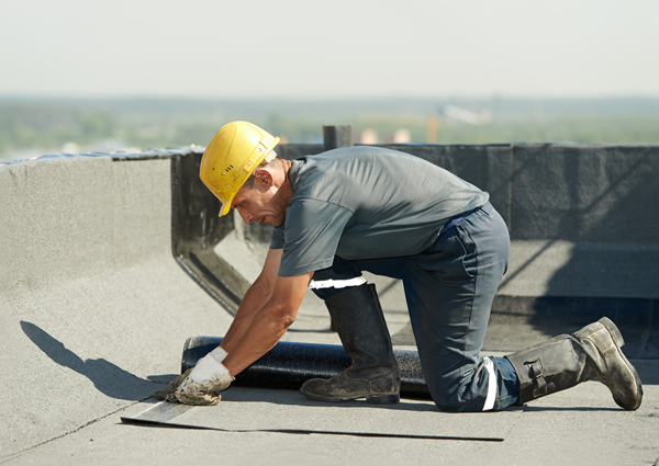 Roofer Performing Maintenance Repair