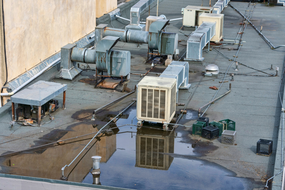 A commercial roof with pooling water.