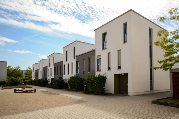 Modern block of townhouses with flat roofs